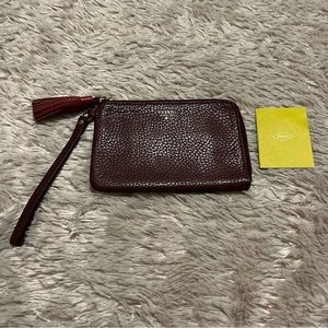 Fossil burgundy pebbled leather wristlet with tassel